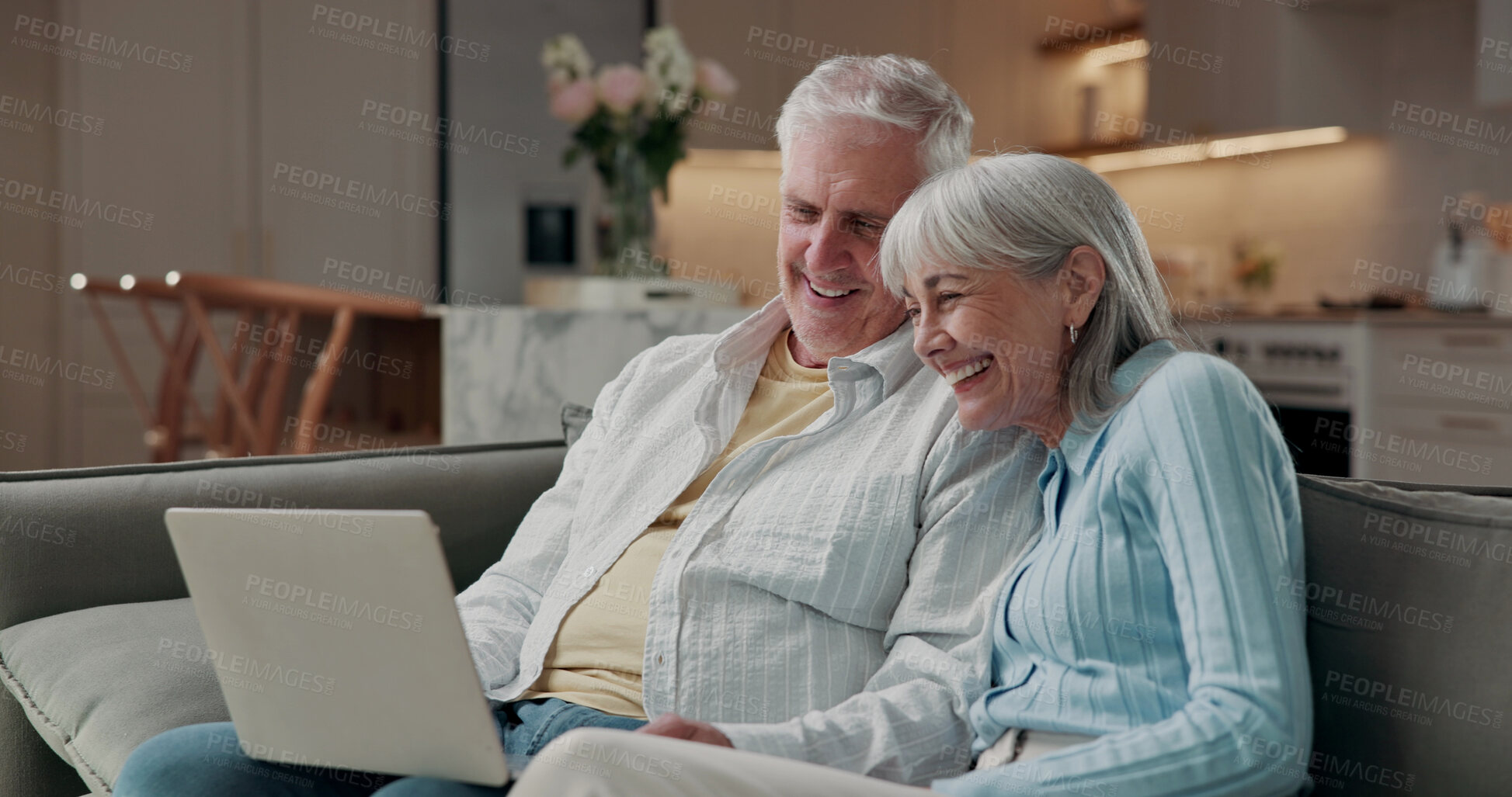 Buy stock photo Senior, laughing and happy couple with laptop on sofa for funny movie, comedy or entertainment. Elderly, man and woman relaxing with smile or computer for humor, joke or online streaming together