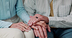 Senior, couple and holding hands with love for empathy, trust or communication together in home. Elderly, man and woman with touch, ring or support for relationship, commitment or connection in house