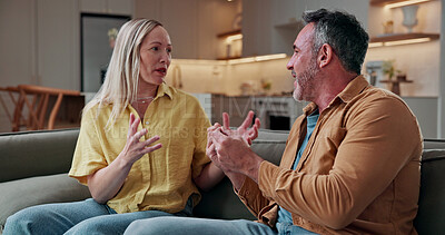 Buy stock photo Argument, dispute and couple on sofa in home with conflict, disagreement or communication in marriage. Fighting, divorce and people in living room for accusation of cheating, affair or infidelity