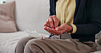 Hands, pills and senior woman with container, wellness and sorting prescription treatment in lounge. Retirement, routine and elderly person with medication, health and organizing supplements in house