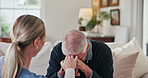 Cane, grief and nurse comforting old man with disability for empathy, healthcare or support. Loss, sadness and walking stick with caregiver speaking to senior patient for compassion or sympathy