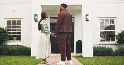 Buy stock photo Holding hands, new home and pride with black couple outdoor for property investment and purchase. Mortgage, real estate and security with man, woman and support for  relocation to dream house
