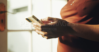 Buy stock photo Text, chat and hands in house with phone, online communication and post reaction on social media app. Digital, typing and woman with technology, message update or networking on virtual platform