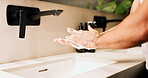 Basin, soap and washing hands with person in bathroom for hygiene, skincare or wellness. Cleaning, disinfection and foam with man at apartment sink to remove bacteria, dirt or germs for maintenance