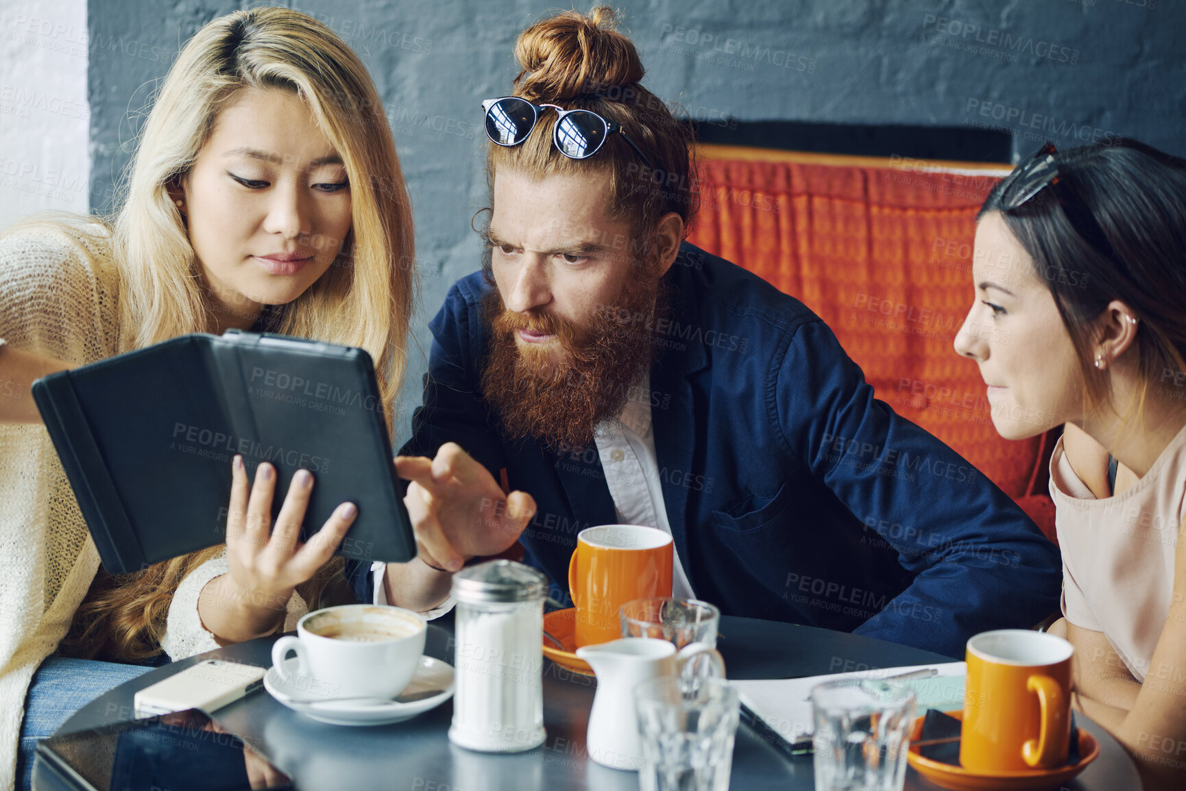 Buy stock photo Tablet, meeting and business people at coffee shop for conversation, brainstorming or creative solution. Team, technology or planning in cafe for content writing, remote work or startup article ideas