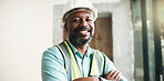 Crossed arms, black man and portrait of construction worker on site with confidence for renovation. Smile, about us and mature civil engineer with pride for repairs, maintenance or building project.