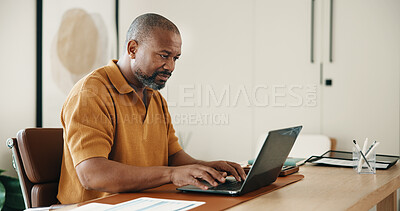 Buy stock photo Remote work, review or black man in home office with laptop, research or budget insight for funding. WFH, digital or mature finance advisor with tech, forecasting or proposal update for investment.