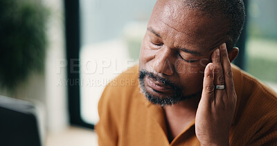 Buy stock photo Headache, laptop and remote work with black man in home office for burnout, deadline or tension. Anxiety, frustration and stress with mature person in apartment for mistake as freelance employee