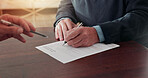 Hands, old person and writing on document with advisor, guidance or form for retirement home. Mature man, consultant and signature in office with paperwork, application and agreement for elderly care