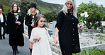 Holding hands, grandmother and girl in graveyard, sad and emotions for grief, bereavement and loss. Family, granny or grandchild with support for funeral, people or burial for death, comfort or roses
