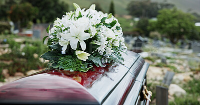 Buy stock photo Coffin, flowers and funeral in graveyard with death, remembrance or burial ceremony for final goodbye. Casket, floral bouquet and memorial service in cemetery outdoor with honor, tribute or tradition