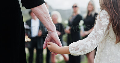 Buy stock photo Holding hands, grandmother or girl in graveyard, back or emotion for grief, bereavement or healing. Family, back or grandkid with support for funeral, people or burial for death, sad or compassion
