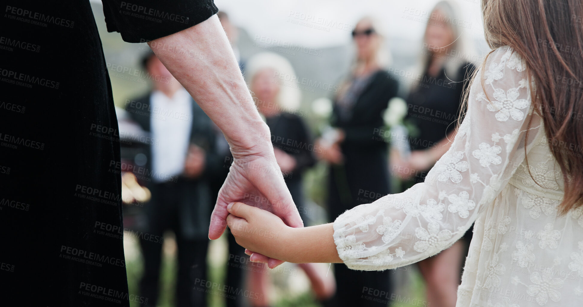 Buy stock photo Holding hands, grandmother or girl in graveyard, back or emotion for grief, bereavement or healing. Family, back or grandkid with support for funeral, people or burial for death, sad or compassion