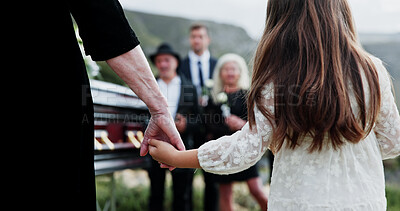 Buy stock photo Holding hands, mother and girl in cemetery, back and emotions for loss, bereavement and sad. People, parent and daughter with support for funeral, empathy or burial for death, comfort or compassion