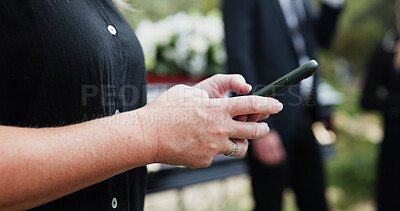 Buy stock photo Funeral, hands and woman in cemetery, cellphone for online chatting and post for memory. Family, connection and person in graveyard, smartphone and message to contact and digital app for social media