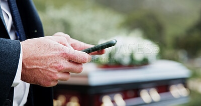 Buy stock photo Funeral, hands and man in graveyard, smartphone for online chatting and post for memory. Family, texting and person in cemetery, cellphone or message to contact and loss with communication or space
