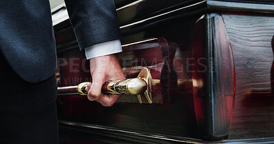 Buy stock photo Hands, handle and man with coffin for funeral, sad and compassion for death ceremony. Closeup, person and bereavement with casket, memorial service or support for loss, religion or respect with grief