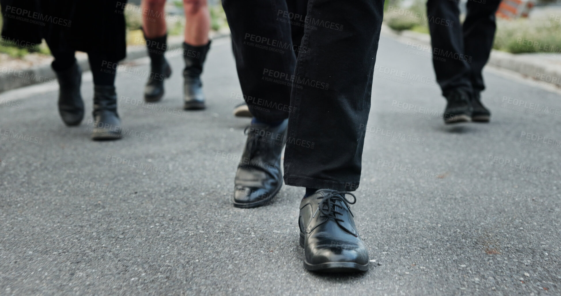 Buy stock photo People, shoes and walking at graveyard with funeral procession, loss and burial ceremony outdoor. Person, feet and journey in cemetery with family mourning, memorial service and grief together