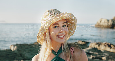 Buy stock photo Smile, sunhat and portrait of woman at beach for summer vacation, relax and tropical adventure. Happiness, weekend break and getaway trip with female person outdoor for tourism, island and coastline