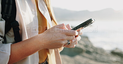 Buy stock photo Hands, texting and phone with woman at beach for travel blogger, social media and summer vacation post. Communication, online holiday guide and contact with person outdoor for tourism and chat