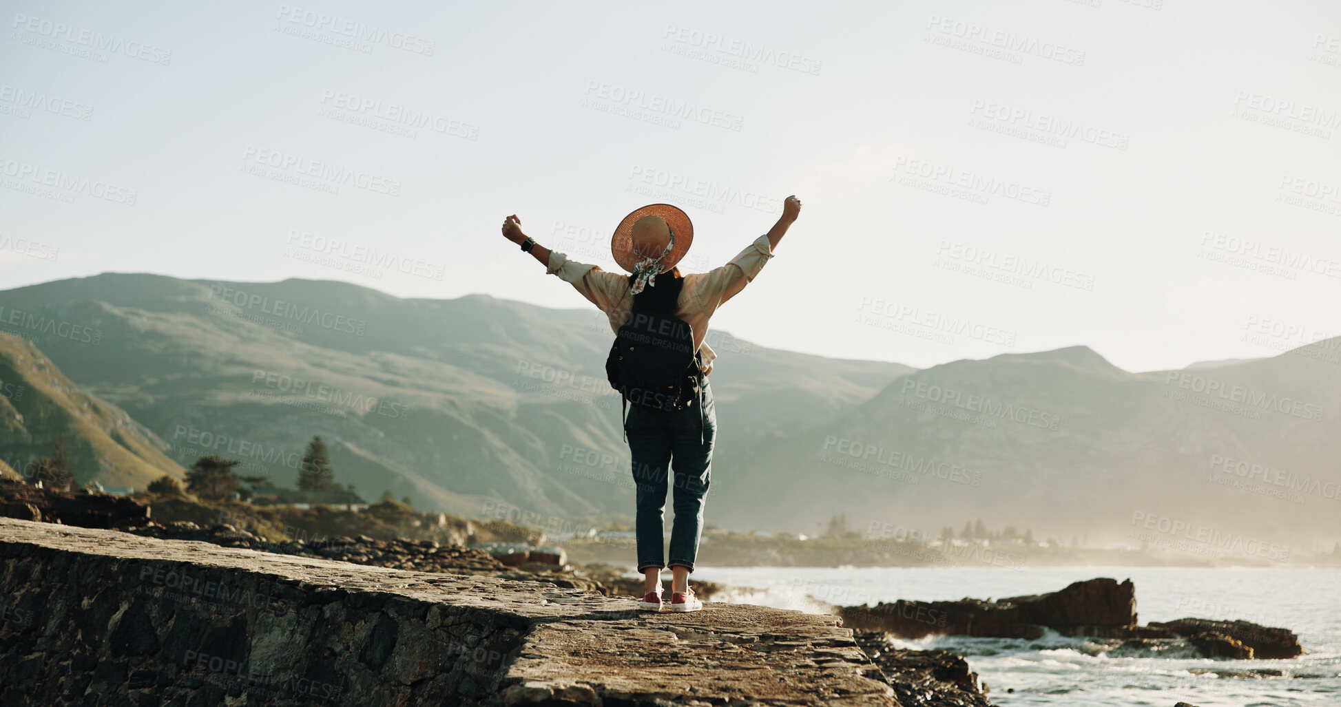 Buy stock photo Travel, back and excited with woman at beach for summer vacation view, freedom and adventure. Holiday getaway, tropical island and arms up with person for celebration, inspiration and weekend break