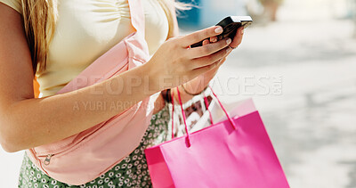 Buy stock photo Phone, shopping bag and hands with woman in city for communication, online promotion and sale. Digital coupon, store credit check and contact with person outdoor for customer rewards app and retail