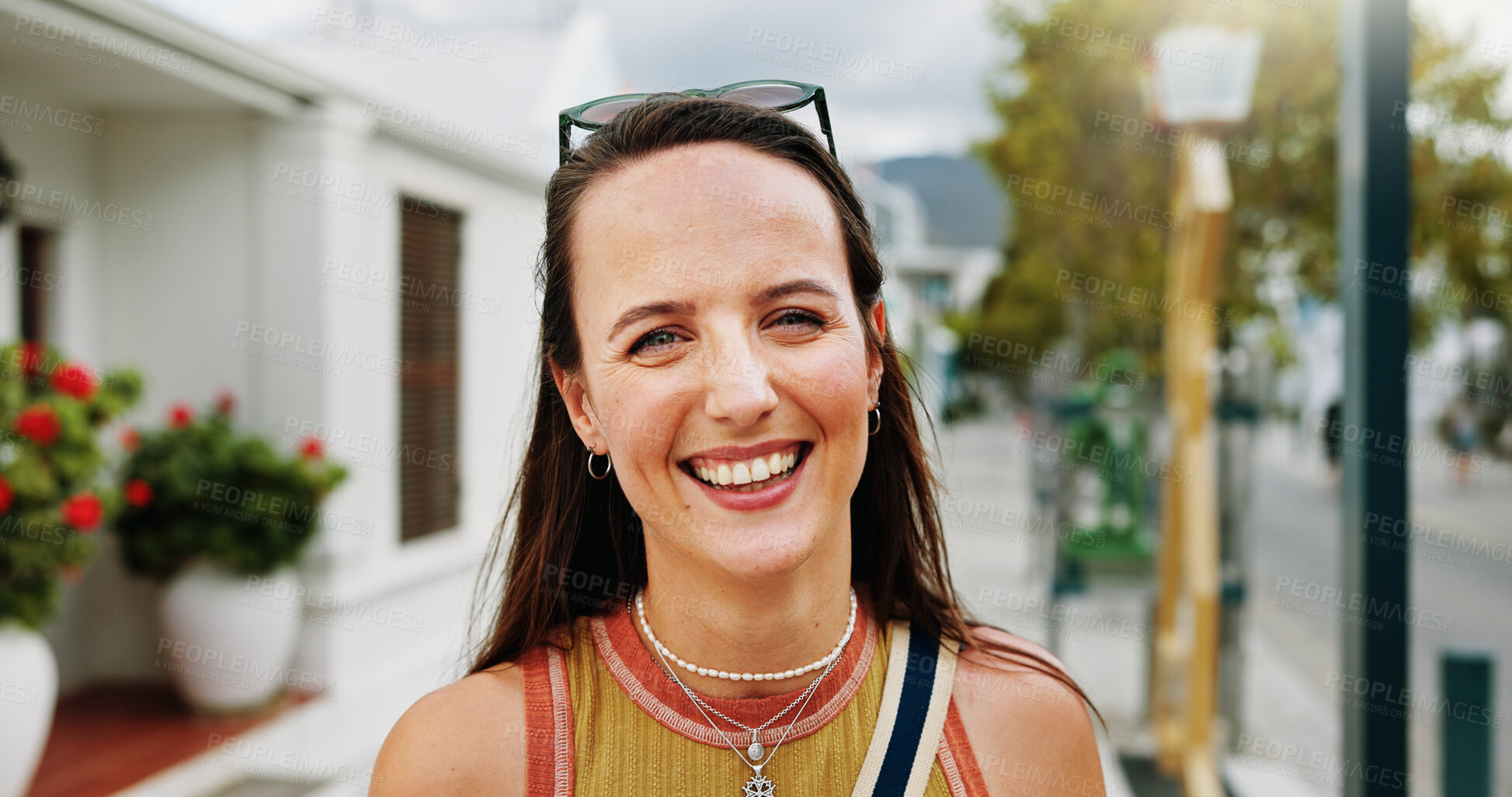 Buy stock photo Portrait, woman and happy in city with summer holiday, weekend getaway or travel for tourist adventure. Female person, smile and outdoor with downtown exploration, positive attitude or vacation trip.