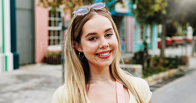 Buy stock photo Portrait, woman and happy in town with summer holiday, weekend getaway or travel for tourist adventure. Female person, smile and outdoor in city with exploration, positive attitude and vacation trip.