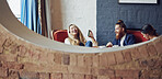 Friends, laughing and woman with phone in cafe, bonding and watching comedy show on social media app. Coffee shop, hospitality and happy people with mobile on weekend, entertainment and funny video
