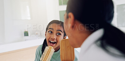 Buy stock photo Mom, girl and singing with brush in bathroom for fun grooming or spa day together in home. Mother, child or bonding with vibe, haircare or playful karaoke for beauty, love or salon treatment in house