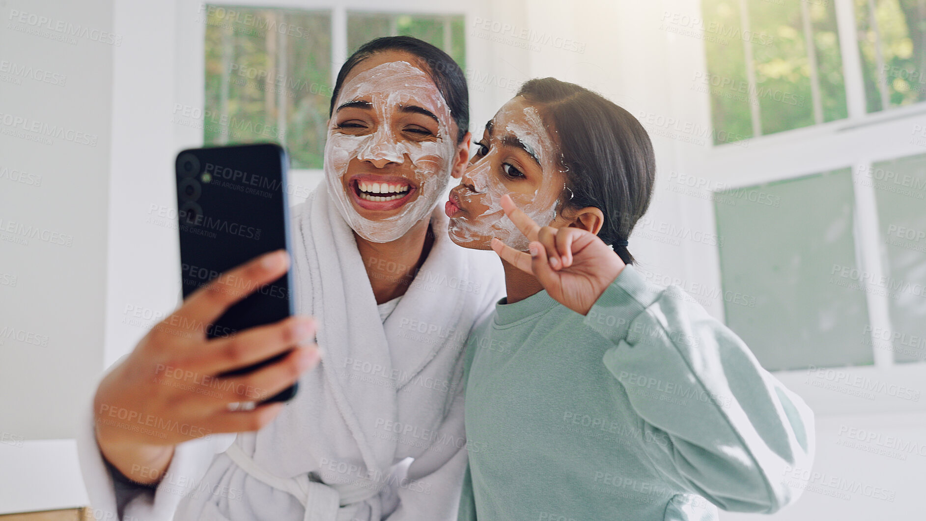 Buy stock photo Happy mom, girl and peace sign with face mask for selfie, social media post or spa day together. Mother, child or daughter with smile, facial treatment or app for morning routine or picture in home