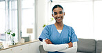 Portrait, nurse and happy woman in nursing home with arms crossed, healthcare and wellness service. Smile, confidence and caregiver in house for homecare support, about us and medical professional