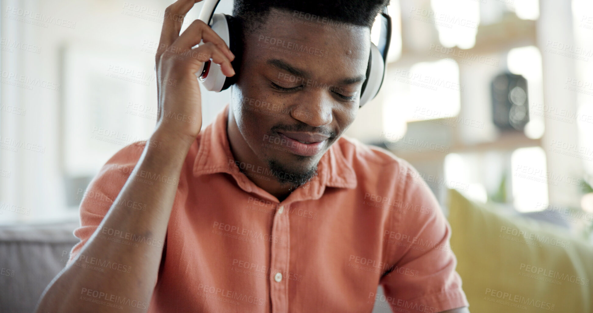 Buy stock photo Streaming, music and man with headphones in lounge, internet connection or listening to song in home. Happy, black person and audio with app subscription, online and relax with technology in house