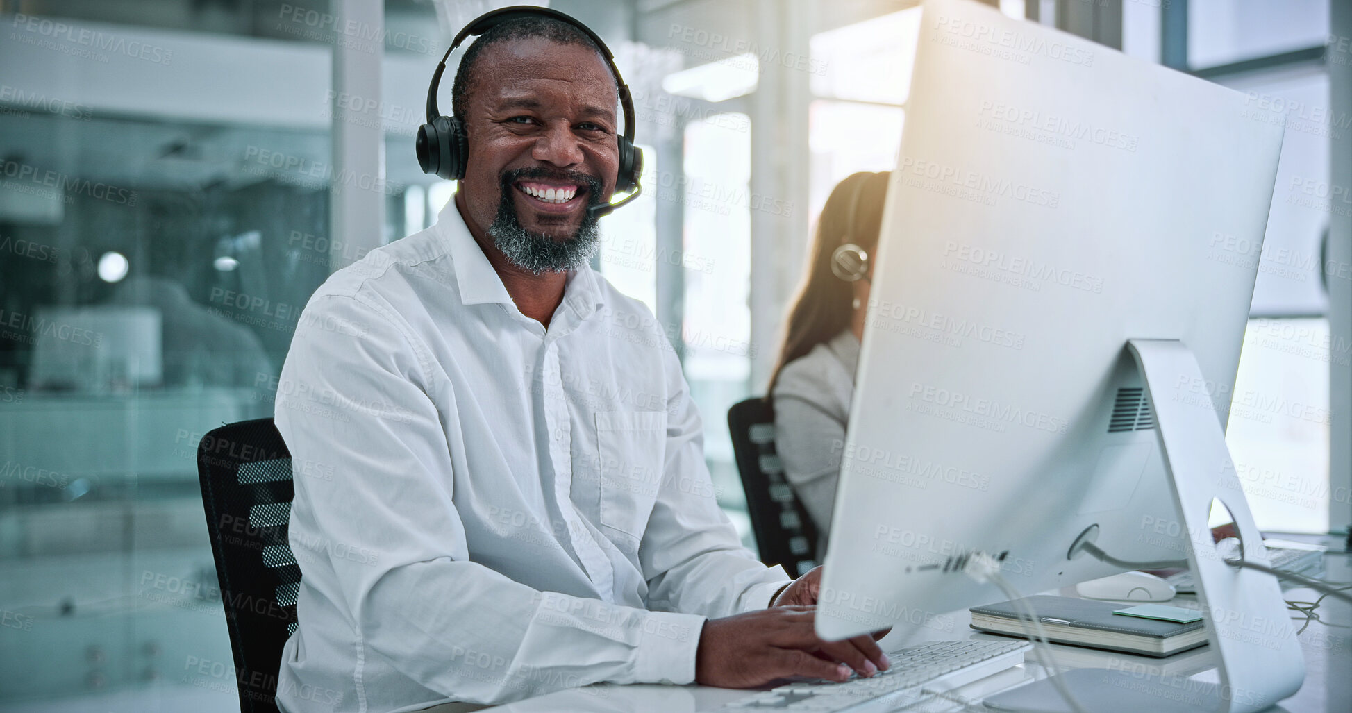 Buy stock photo Call center, smile and portrait of man with computer for contact us, troubleshooting and help desk. Customer support, coworking and tech hotline with mature person for consulting, headset and chat