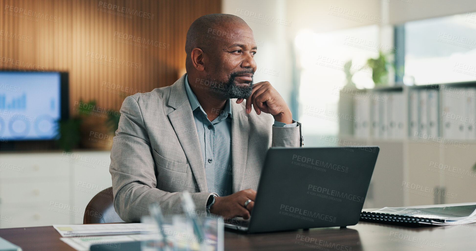 Buy stock photo Mature, businessman and thinking in office with laptop, data analysis or forecast for sales performance. Black person, brainstorming and computer in workplace with stats, graphs or revenue projection