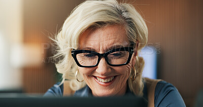Buy stock photo Businesswoman, smile and reading in office with laptop, glasses and good news for financial audit. Mature person, research and accounting in workplace with spectacles, computer and positive feedback.