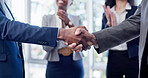 Business, clap or people in workplace with handshake, meeting success or celebration in b2b deal. Partnership, applause or employee with shaking hands, agreement or achievement in merger opportunity.