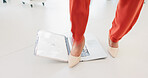 Feet, laptop and stomp with business woman in office for destruction, frustration or rage. Computer, high heels and smash with angry employee in corporate workplace for breakdown, crisis or disaster