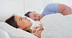 Sleep, conflict or sad woman thinking in bed for partner betrayal, emotional distance or infidelity. Couple, rest and wife overthinking in home for unhappy marriage, contemplating divorce or insomnia