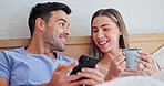 Happy, relax and couple with phone in bed for social media, communication or network connection. Man, woman or chilling with smile or coffee on mobile smartphone for chatting or texting app in home