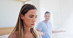 Annoyed, conflict and woman in bedroom of home for argument, disagreement or relationship stress. Anger, fight and frustration with couple on bed in apartment for anger, fail or marriage mistake