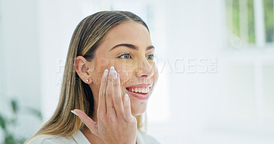 Buy stock photo Beauty, skincare and happy woman with cream in bathroom for hydration, skin wellness and space. Smile, person and apply facial lotion with moisturizer, dermatology benefits or morning routine at home