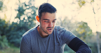 Buy stock photo Fitness, man and tired with breathing outdoor for cardio challenge, wellness break and recovery. Athlete, person and exhausted in nature with runner fatigue, practice rest and overworked on exercise