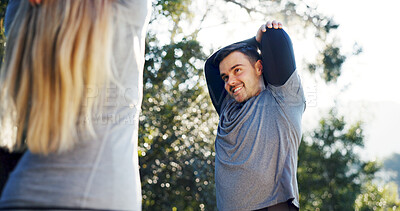 Buy stock photo Fitness, preparing or couple outdoor with stretching, arm mobility or injury prevention in physical activity. Happy, team or people with start, shoulder or muscle improvement in warm up together.