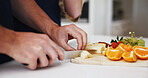 Cooking, hands and wellness with couple in kitchen of home together for diet or nutrition. Fruit, ingredients and recipe with healthy people at counter in apartment for morning meal preparation