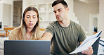 Laptop, home and couple with budget documents, financial records or asset management with review. Computer, man and woman at house with savings paperwork for planning, expense information or bills