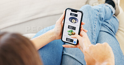 Buy stock photo Food, hands and phone screen for online order with couple on sofa in living room of home together. App, menu and scrolling with people talking in apartment for decision, ecommerce delivery or meal