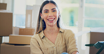 Buy stock photo Moving, woman and happy portrait in new home for property investment, growth pride and mortgage. Relocation, excited homeowner and boxes in house for real estate purchase, achievement or rental goals