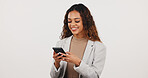 Business, texting or woman in studio with phone, deal closed or good news in online chat. Happy, mockup space or realtor with tech, investment opportunity or email feedback on white background.