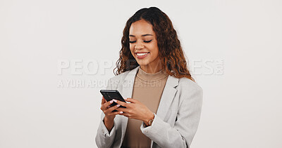 Buy stock photo Business, texting or woman in studio with phone, deal closed or good news in online chat. Happy, mockup space or realtor with tech, investment opportunity or email feedback on white background.